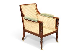 A MAHOGANY AND CANEWORK BERGÈRE, SECOND QUARTER OF 19TH CENTURY, with balus
