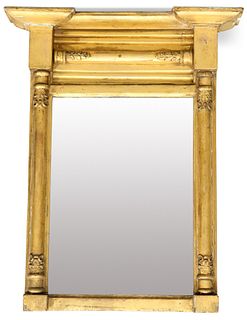 A REGENCY GILTWOOD PIER MIRROR, the rectangular plate flanked and surmounte