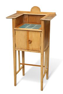 AN ARTS AND CRAFTS BEECH WASHSTAND, with blue-glazed nine tile panel to the