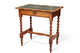 AN UNUSUAL ARTS AND CRAFTS MAHOGANY WRITING TABLE, the rectangular top of w