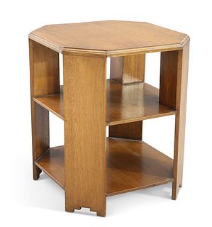 ATTRIBUTED TO HEALS, AN EARLY 20TH CENTURY OAK OCTAGONAL BOOK TABLE, with t