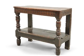 A 17TH CENTURY JOINED OAK BUFFET, with lappet carved frieze and border shel