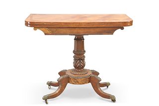 A REGENCY MAHOGANY FOLDOVER TEA TABLE, with leaf and rope carved stem, the 