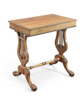 A REGENCY MAHOGANY LYRE-END SIDE TABLE, the rectangular top with beaded edg