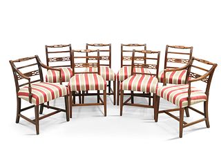 A SET OF EIGHT REGENCY MAHOGANY DINING CHAIRS, including a pair of carvers,