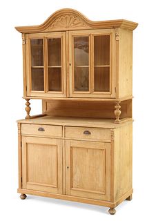 A LATE 19TH CENTURY CONTINENTAL PINE DRESSER, the upper section with arched