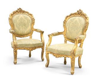 **LOT WITHDRAWN** A PAIR OF LOUIS XV STYLE GILDED AND UPHOLSTERED FAUTEUILS, each with pierce