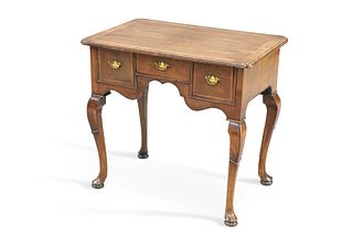 AN 18TH CENTURY FEATHEBANDED WALNUT LOWBOY, the moulded rectangular top wit