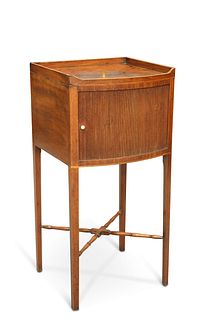 A REGENCY MAHOGANY TAMBOUR-DOOR BEDSIDE TABLE, bow-fronted, raised on squar