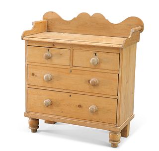 A SMALL VICTORIAN PINE CHEST OF DRAWERS, with gallery back, fitted with two