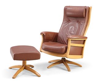 AN ERCOL LEATHER UPHOLSTERED RECLINING SWIVEL ARMCHAIR, with footstool en-s