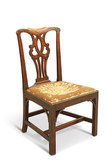 A GEORGE III MAHOGANY SIDECHAIR, 18TH CENTURY, the crest rail carved with l