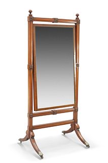 A REGENCY MAHOGANY CHEVAL MIRROR, the rectangular mirror plate swivelling w