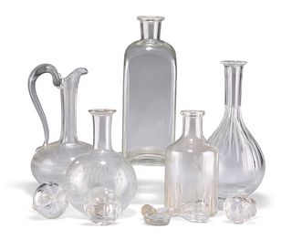 A COLLECTION OF 19TH CENTURY AND LATER GLASS DECANTERS, CLARET JUGS AND STO