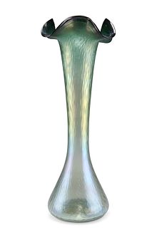 A JOSEF RINDSKOPF IRIDESCENT GLASS VASE, CIRCA 1905, with undulating green 