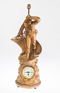 A 19TH CENTURY FRENCH SPELTER CLOCK LAMP, the circular dial within a natura