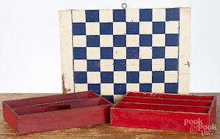 Painted gameboard, ca. 1930, 12 1/2'' x 16'', together with a pair of utensil trays, 7'' l., 11 1/4'' w.