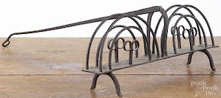 Wrought iron toaster, 19th c., 22 1/2'' h., 14 1/4'' w.