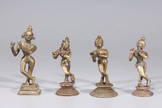 Group of Four Antique Indian Flute Playing Krishna Figures