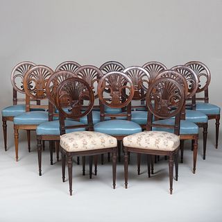 Set of Fourteen Directoire Style Carved Mahogany Dining Chairs