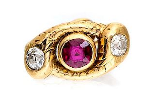* A Victorian Yellow Gold, Ruby and Diamond Twin Snake Ring, 5.40 dwts.