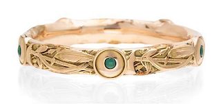 An Art Nouveau Yellow Gold and Turquoise Bangle Bracelet, Riker Brothers, 15.10 dwts.