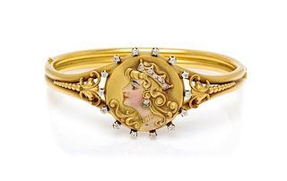 An Art Nouveau Yellow Gold, Diamond and Enamel Bangle Bracelet, 13.60 dwts.
