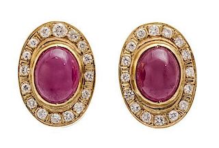 A Pair of 14 Karat Yellow Gold, Ruby and Diamond Earclips, 5.60 dwts.