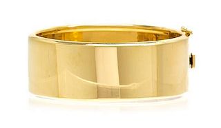 * A 14 Karat Yellow Gold Bangle Bracelet, 24.00 dwts.
