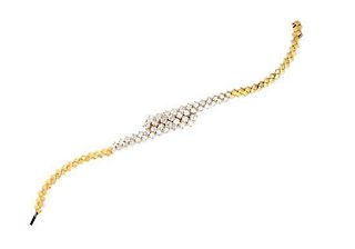 * An 18 Karat Yellow Gold and Diamond Bracelet, 11.70 dwts.