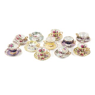 Grouping of 11 Japanese Porcelain Tea Cups and Saucers
