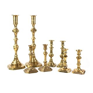Grouping of Eight English Brass Candlesticks