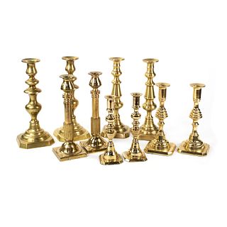Grouping of Eight Brass Candlesticks