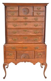Queen Anne Tiger Maple Highboy in Two Parts
upper section having central pinwheel carved drawer flanked by small drawers, over four drawers flanked by