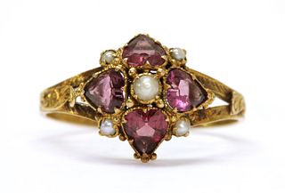 A Victorian 15ct gold garnet and split pearl ring,