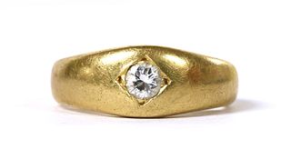 An 18ct gold diamond set ring,