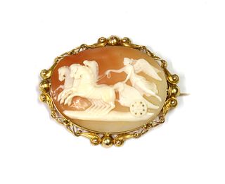A gold mounted Victorian shell cameo brooch,