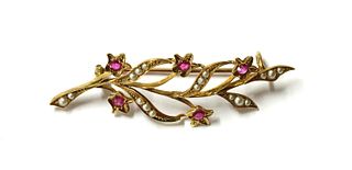 A gold ruby and split pearl spray brooch,
