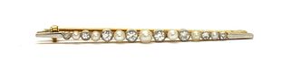 A gold diamond and pearl brooch,