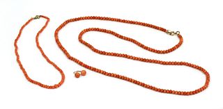 A single row uniform coral bead necklace,