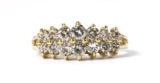 A gold two row diamond ring,