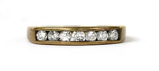 A 9ct gold half eternity ring,