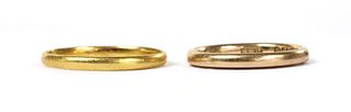 Two gold wedding rings,
