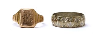 A gold signet ring,