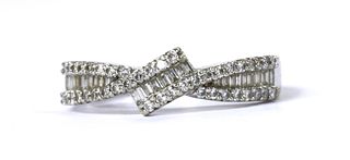 An 18ct white gold diamond crossover ring,