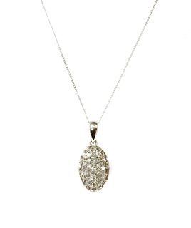 A white gold diamond cluster pendant,