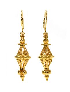 A pair of gold lantern style drop earrings,