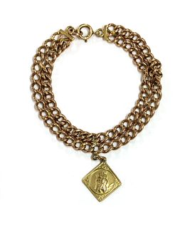 A gold two row curb link bracelet,