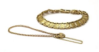 A gold panel bracelet,