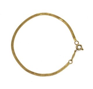A gold herringbone link bracelet,